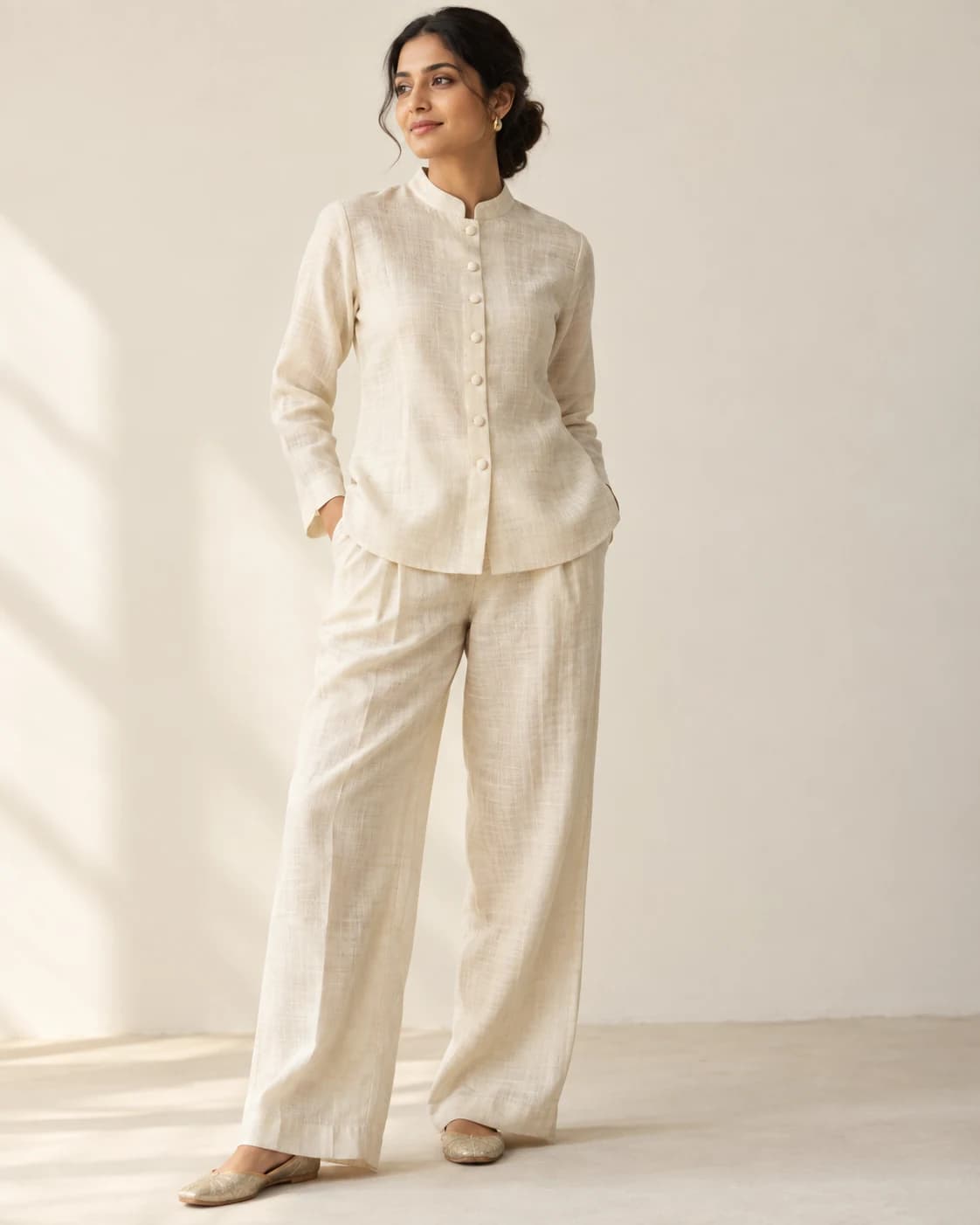 Woman wearing the Chanderi Bandhgala Shirt in Warm Ivory